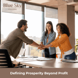 Three people smiling, stacking hands in a bright office. The scene conveys teamwork and positivity. Text: "Blue Sky Coaching: Defining Prosperity Beyond Profit."